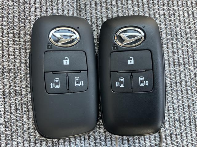 ムーヴキャンバスストライプスＧ　フロントシートヒーター　ツートンカラー中古車保証・距離無制限、１年付き　純正ＣＤチューナー　フロントシートヒーター　両側電動スライドドア　ホールド機能付き電動サイドブレーキ　ＬＥＤヘッドライト　ほっとカップホルダー　コーナーセンサー（東京都）の中古車
