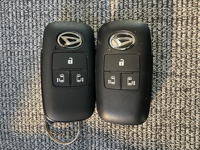 ムーヴキャンバスストライプスG フロントシートヒーター キーフリー保証 新車保証・まごころ保証 1年間・走行距離無制限付き 純正CDチューナー フロントシートヒーター 両側電動スライドドア ホールド機能付き電動サイドブレーキ ほっとカップホルダー カーペットマット(東京都)の中古車