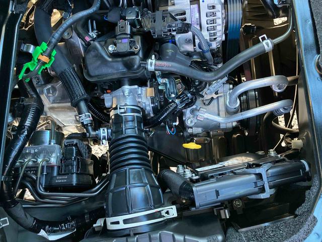 ハイゼットカーゴクルーズ　届け出済み未使用車　ディスプレイオーディオ保証　新車保証・まごころ保証　１年間・走行距離無制限付き　スマホ連携９インチディスプレイオーディオ　バックカメラ　電動格納ドアミラー　アイドリンストップ　リヤ分割シート　オートライト（東京都）の中古車