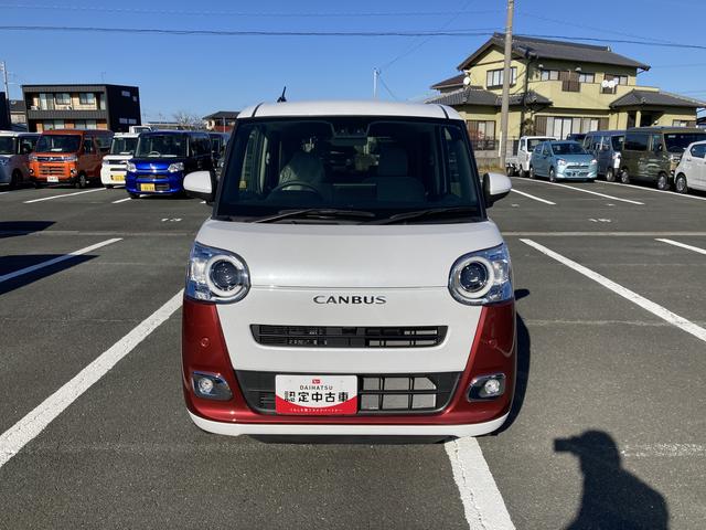 ムーヴキャンバスストライプスGターボ14インチフルホイールキャップ キーフリーシステム プッシュボタンスタート UVカットガラス 両側パワースライドドア ハロゲンヘッドライト ラゲージアンダーボックス(静岡県)の中古車