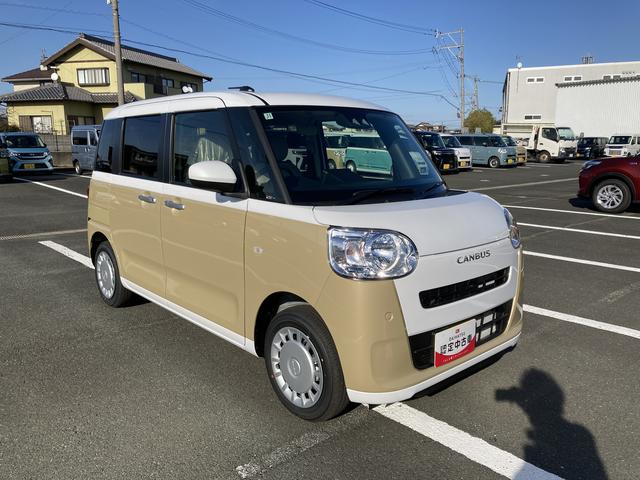 ムーヴキャンバスストライプスX14インチフルホイールキャップ キーフリーシステム プッシュボタンスタート UVカットガラス 両側パワースライドドア ハロゲンヘッドライト ラゲージアンダーボックス(静岡県)の中古車