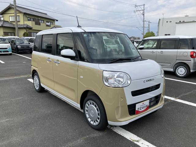 ムーヴキャンバスストライプスX14インチフルホイールキャップ キーフリーシステム プッシュボタンスタート UVカットガラス 両側パワースライドドア ハロゲンヘッドライト ラゲージアンダーボックス(静岡県)の中古車