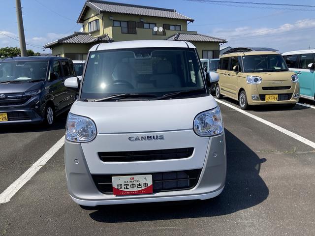 ムーヴキャンバスストライプスX14インチフルホイールキャップ キーフリーシステム プッシュボタンスタート UVカットガラス 両側パワースライドドア ハロゲンヘッドライト ラゲージアンダーボックス(静岡県)の中古車