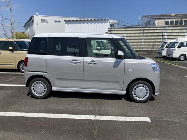 ムーヴキャンバスストライプスX14インチフルホイールキャップ キーフリーシステム プッシュボタンスタート UVカットガラス 両側パワースライドドア ハロゲンヘッドライト ラゲージアンダーボックス(静岡県)の中古車