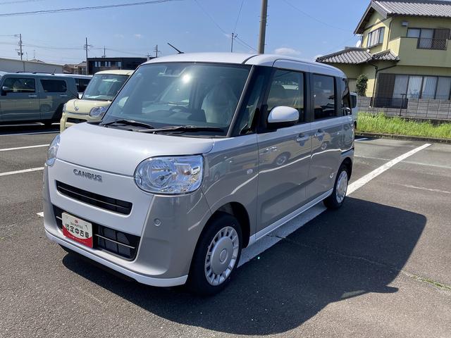 ムーヴキャンバスストライプスX14インチフルホイールキャップ キーフリーシステム プッシュボタンスタート UVカットガラス 両側パワースライドドア ハロゲンヘッドライト ラゲージアンダーボックス(静岡県)の中古車