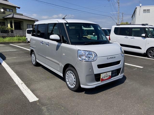 ムーヴキャンバスストライプスX14インチフルホイールキャップ キーフリーシステム プッシュボタンスタート UVカットガラス 両側パワースライドドア ハロゲンヘッドライト ラゲージアンダーボックス(静岡県)の中古車