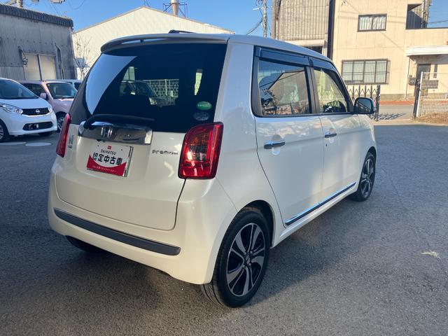 Ｎ−ＯＮＥプレミアム　ツアラー・Ｌパッケージ衝突安全ボディ　プッシュスタートボタン　オートエアコン　スマートキー　７インチナビ　バックカメラ　ステアリングスイッチ　１５インチアルミホイール　ディスチャージヘッドランプ（和歌山県）の中古車