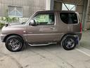 ジムニー 中古車 クロスアドベンチャー軽自動車　キーレスエントリー　ＥＴＣ車載器　７インチナビ　４ＷＤ　横開きバックドア　ハロゲンヘッドランプ　マニュアルエアコン　１６インチアルミホイール