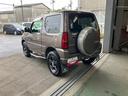 ジムニー 中古車 クロスアドベンチャー軽自動車　キーレスエントリー　ＥＴＣ車載器　７インチナビ　４ＷＤ　横開きバックドア　ハロゲンヘッドランプ　マニュアルエアコン　１６インチアルミホイール