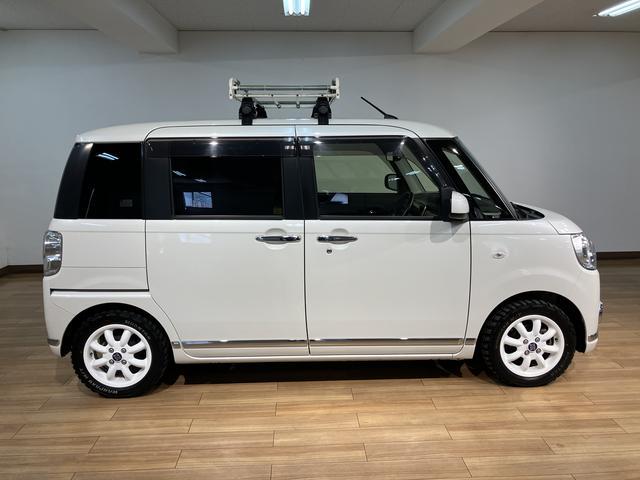 ムーヴキャンバスＧブラックインテリアリミテッド　ＳＡIII／４ＷＤ／ナビ／１年間走行距離無制限保証／衝突軽減ブレーキ／４ＷＤ／マッドタイヤ／ルーフキャリア／８インチナビ／パノラマモニター／ドラレコ／ＥＴＣ／両側電動スライドドア／シートヒーター／Ｂｌｕｅｔｏｏｔｈ／フルセグ／（大阪府）の中古車