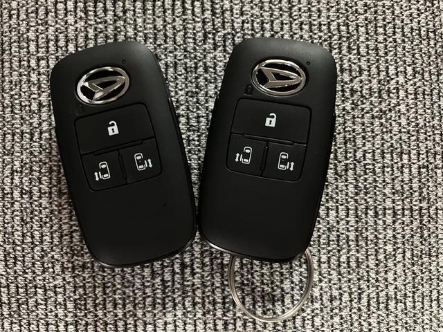 ムーヴキャンバスストライプスGターボ/届出済未使用車/電動スライド/クルコン届出済み未使用車/ダイハツ認定中古車/衝突軽減ブレーキ/ターボエンジン/電動スライドドア/クルーズコントロール/スマートキー/オートエアコン/LEDヘッドライト・フォグ/電動Pブレーキ/(大阪府)の中古車