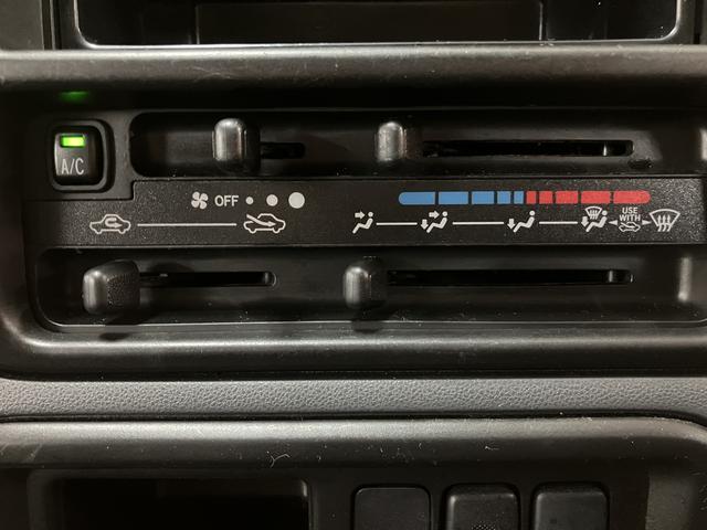 ハイゼットカーゴＤＸ　ＡＭ／ＦＭラジオ／キーレス／ＥＴＣ／タイミングチェーンＡＭ／ＦＭラジオ　マニュアルエアコン　キーレス　ＥＴＣ　前席パワーウィンドウ　リヤスモークガラス（大阪府）の中古車