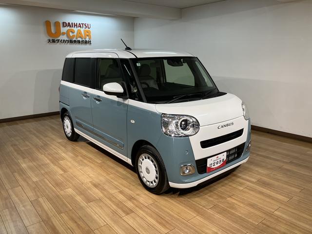 ムーヴキャンバスストライプスＧターボ　届出済未使用車　サポカーＳワイド適合届出済未使用車・ターボエンジン・純正メモリーナビ・バックカメラ・ナビ連動前後ドライブレコーダー・全車速追従クルーズコントロール・両側電動スライドドア・シートヒーター・ホッとカップホルダー・ＬＥＤライト（大阪府）の中古車