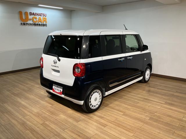 ムーヴキャンバスストライプスG 弊社元試乗車/25年ナビ/バックカメラサポカーSワイド適合 バックカメラ対応 USB接続端子 電動パーキングブレーキ シートヒーター 両側オートスライドドア Pスタート ホッとカップホルダー キーフリー(大阪府)の中古車