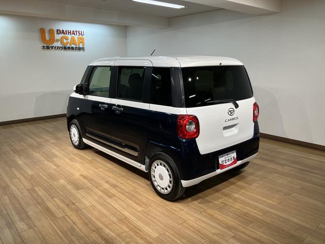 ムーヴキャンバスストライプスG 弊社元試乗車/25年ナビ/バックカメラサポカーSワイド適合 バックカメラ対応 USB接続端子 電動パーキングブレーキ シートヒーター 両側オートスライドドア Pスタート ホッとカップホルダー キーフリー(大阪府)の中古車