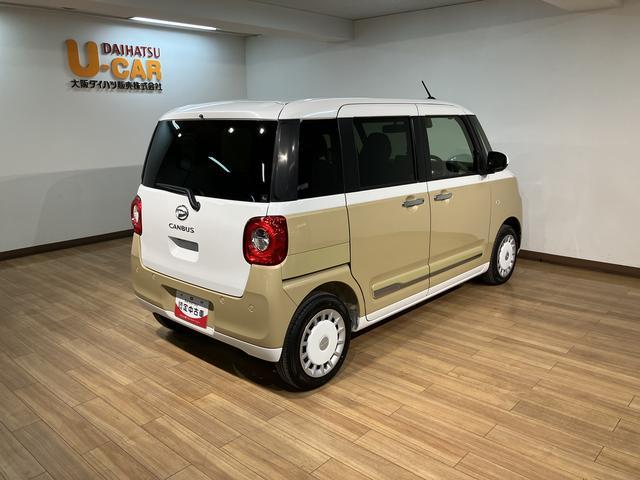 ムーヴキャンバスストライプスG 弊社元試乗車/25年ナビ/バックカメラサポカーSワイド適合 バックカメラ対応 USB接続端子 電動パーキングブレーキ シートヒーター 両側オートスライドドア Pスタート ホッとカップホルダー キーフリー(大阪府)の中古車