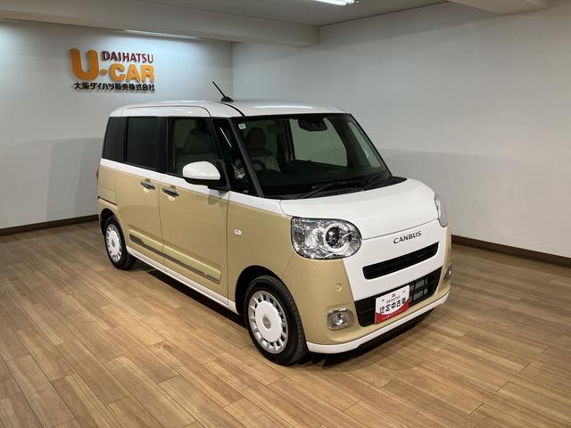 ムーヴキャンバスストライプスＧターボ　弊社元試乗車／２５年ナビ／バックカメラサポカーＳワイド適合　バックカメラ対応　ＵＳＢ接続端子　電動パーキングブレーキ　シートヒーター　両側オートスライドドア　Ｐスタート　ホッとカップホルダー　キーフリー（大阪府）の中古車