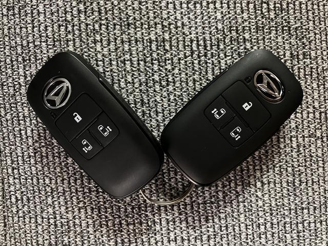 ムーヴキャンバスストライプスＧターボ　２５年ナビ／バックカメラ／走行３３ｋｍサポカーＳワイド適合　バックカメラ対応　ＵＳＢ接続端子　電動パーキングブレーキ　シートヒーター　両側オートスライドドア　Ｐスタート　ホッとカップホルダー　キーフリー（大阪府）の中古車