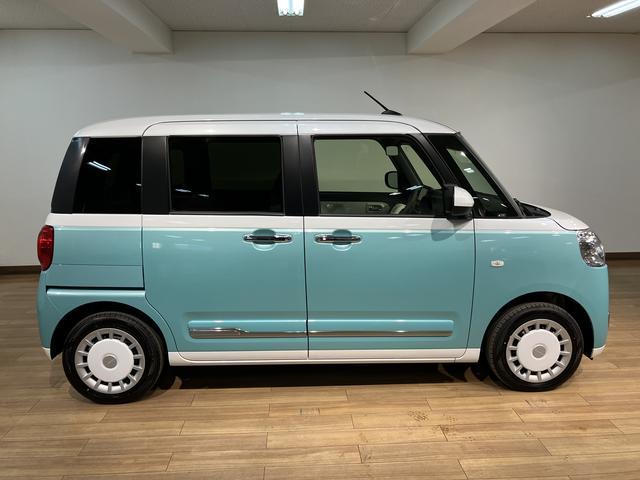 ムーヴキャンバスストライプスＧ　Ｒ７年式／ナビ／バックカメラ／走行１２ｋｍサポカーＳワイド適合　バックカメラ対応　ＵＳＢ接続端子　電動パーキングブレーキ　シートヒーター　両側オートスライドドア　Ｐスタート　ホッとカップホルダー　キーフリー（大阪府）の中古車