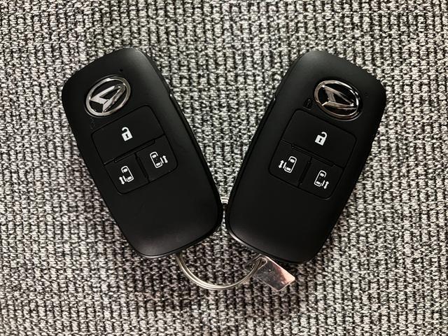 ムーヴキャンバスストライプスＧ　Ｒ７年式／ナビ／バックカメラ／走行１２ｋｍサポカーＳワイド適合　バックカメラ対応　ＵＳＢ接続端子　電動パーキングブレーキ　シートヒーター　両側オートスライドドア　Ｐスタート　ホッとカップホルダー　キーフリー（大阪府）の中古車