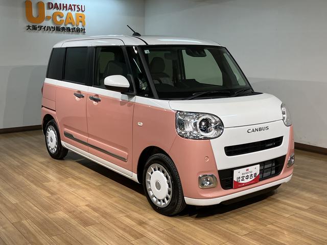 ムーヴキャンバスストライプスGターボ/届出済未使用車/クルコン/電動スライドダイハツ認定中古車/届出済み未使用車/ターボ/衝突軽減ブレーキ/クルーズコントロール/両側電動スライドドア/シートヒーター/電動Pブレーキ/LEDヘッドライト・フォグ/スマートキー/オートエアコン/(大阪府)の中古車