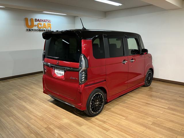 N−BOXカスタムLターボ/ホンダセンシング/9インチナビ/Bカメラ/クルコンホンダセンシング/9インチナビ/バックカメラ/ステアリングスイッチ/ETC/前後ドラレコ/クルーズコントロール/両側パワースライドドア/LEDヘッドライト/アルミホイール/オートエアコン/キーフリー(大阪府)の中古車