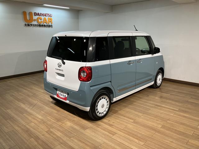 ムーヴキャンバスストライプスＧ／９インチディスプレイオーディオ／両側パワスラ新車保証継承／走行４ｋｍ／９インチディスプレイオーディオ／パノラマ／両側パワースライドドア／ＬＥＤヘッドライト・フォグランプ／前席シートヒーター／ホットカップホルダー／オートハイビーム／ワイヤレス充電（大阪府）の中古車