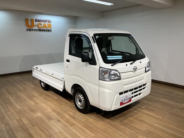 ハイゼットトラックスタンダード 2WD/5MT/令和3年式/荷台作業灯令和3年式/走行7.0万キロ/5MT/2WD/荷台作業灯/AM/FMラジオ/テールゲートチェーン/ラバーマット/ロングバイザー/ハロゲンヘッドライト/オートライト(大阪府)の中古車