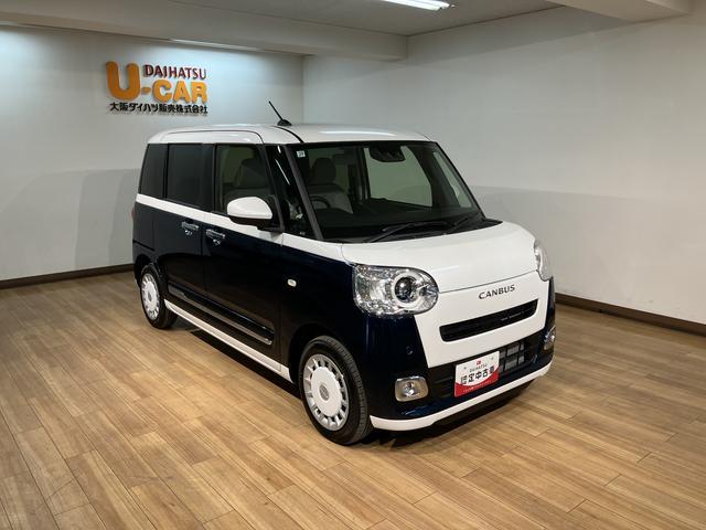 ムーヴキャンバスストライプスG 元試乗車/純正ナビ/バックカメラ令和7年式/走行0.1万キロ/元試乗車/両側パワースライドドア/キーフリー/LEDヘッドライト/純正ナビ/Bluetooth/フルセグ/CD/DVD/バックカメラ/フォグランプ/(大阪府)の中古車