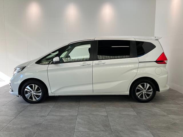 フリード＋Ｇ・ホンダセンシング　９型ナビ　レーダークルコン追突被害軽減ブレーキ　スマートキー　前席シートヒーター　９型フルセグナビ　ＤＶＤ　Ｂｌｕｅｔｏｏｔｈ　ＵＳＢ　ＭＳＶ　ナビ連動ドラレコ　レーダークルーズコントロール　両側電動スライドドア（滋賀県）の中古車