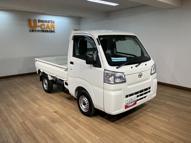 ハイゼットトラックスタンダード/サポカーSワイド適合/1年保証/車検整備付1年間走行距離無制限保証 車検整備付 AM/FMラジオ パワーステアリング エアコン 前後コーナーセンサー アイドルストップ機能 オートライト 3方開 ガードフレームプロテクター(大阪府)の中古車