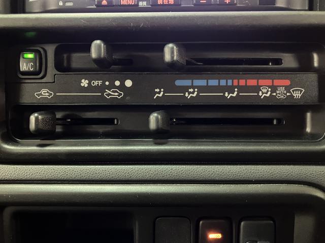 ハイゼットカーゴクルーズ１年間距離無制限保証／オートマ／ナビ／ワンセグ／エアコン／電動格納ドアミラー／パワーウィンドウ／（大阪府）の中古車