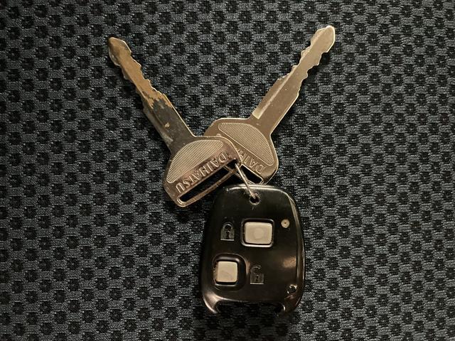 ハイゼットカーゴクルーズ１年間距離無制限保証／オートマ／ナビ／ワンセグ／エアコン／電動格納ドアミラー／パワーウィンドウ／（大阪府）の中古車