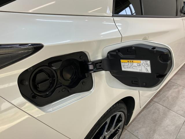 プリウスPHVSナビパッケージ・GRスポーツ 11型ナビ バックカメラトヨタセーフティセンス 11.6型フルセグナビ バックカメラ Bluetooth USB ETC2.0 レーダークルコン シートヒーター 革シート LED オートライト オートエアコン(滋賀県)の中古車