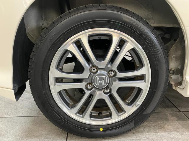 Ｎ−ＢＯＸカスタムＧ・Ｌパッケージ　フルセグナビ　バックカメラ　車検整備付フルセグナビ　バックカメラ　ＤＶＤ再生　Ｂｌｕｅｔｏｏｔｈ　ＨＩＤヘッドライト　オートエアコン　スマートキー　電動格納式ミラー　左側電動スライドドア　エコアイドル（滋賀県）の中古車