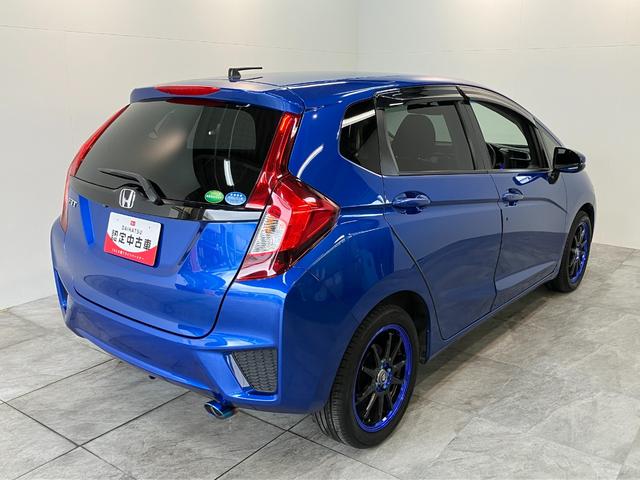 フィット１３Ｇ・Ｆパッケージ　ワンセグナビ　バックカメラ　車検整備付ワンセグナビ　バックカメラ　ＤＶＤ再生　ＵＳＢ　ＥＴＣ　社外アルミ　ＬＥＤ　オートライト　オートエアコン　スマートキー　電動格納式ミラー　エコアイドル（滋賀県）の中古車