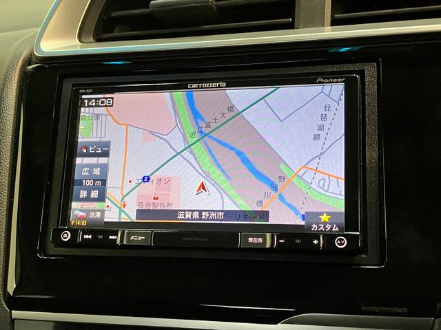 フィット１３Ｇ・Ｆパッケージ　ワンセグナビ　バックカメラ　車検整備付ワンセグナビ　バックカメラ　ＤＶＤ再生　ＵＳＢ　ＥＴＣ　社外アルミ　ＬＥＤ　オートライト　オートエアコン　スマートキー　電動格納式ミラー　エコアイドル（滋賀県）の中古車