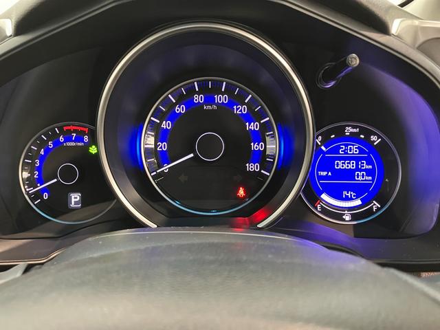 フィット１３Ｇ・Ｆパッケージ　ワンセグナビ　バックカメラ　車検整備付ワンセグナビ　バックカメラ　ＤＶＤ再生　ＵＳＢ　ＥＴＣ　社外アルミ　ＬＥＤ　オートライト　オートエアコン　スマートキー　電動格納式ミラー　エコアイドル（滋賀県）の中古車