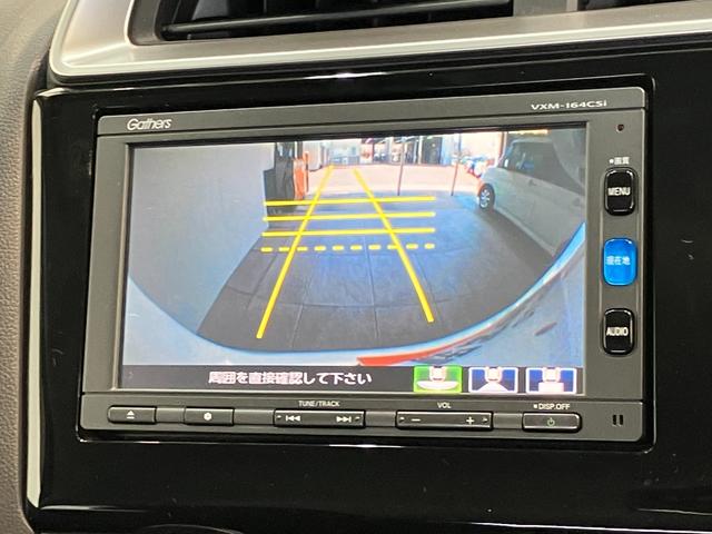 フィット13G ワンセグナビ バックカメラ キーレス ETC車載器ワンセグナビ Bluetooth バックカメラ ETC キーレスエントリー 電動格納式ミラー マニュアルレベリング エコアイドル(滋賀県)の中古車