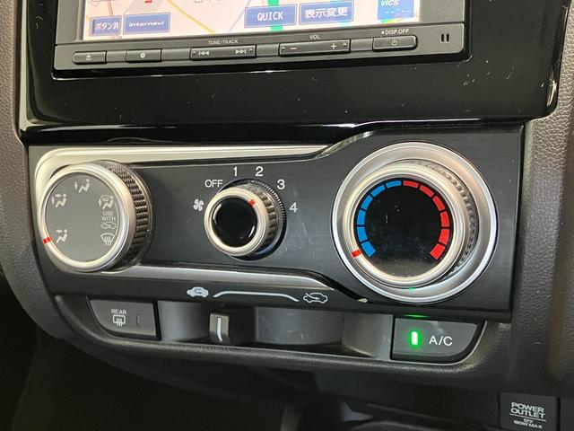 フィット13G ワンセグナビ バックカメラ キーレス ETC車載器ワンセグナビ Bluetooth バックカメラ ETC キーレスエントリー 電動格納式ミラー マニュアルレベリング エコアイドル(滋賀県)の中古車
