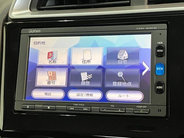 フィット13G ワンセグナビ バックカメラ キーレス ETC車載器ワンセグナビ Bluetooth バックカメラ ETC キーレスエントリー 電動格納式ミラー マニュアルレベリング エコアイドル(滋賀県)の中古車