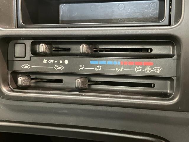 ハイゼットトラックスペシャル　パートタイム４ＷＤ　５ＭＴ　ＡＭ／ＦＭラジオパートタイム４ＷＤ　５速マニュアルミッション車　ＡＭ／ＦＭラジオ　マニュアルレベリング　ゲートプロテクター　テールゲートチェーン（滋賀県）の中古車