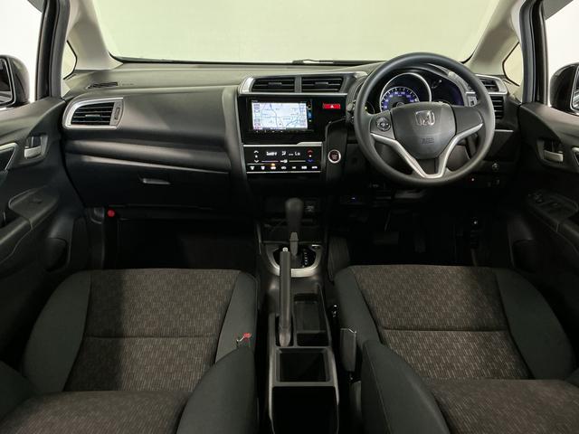 フィット13G・Fパッケージ 禁煙車 ワンオーナー ナビTV ETC1年保証 禁煙車 ワンオーナー ナビTV ETC バックカメラ 後席モニター Bluetooth スマートキー プッシュスタート 横滑り防止装置 オートライト オートエアコン ドアバイザー(兵庫県)の中古車
