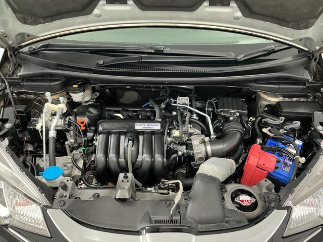 フィット13G・Fパッケージ 禁煙車 ワンオーナー ナビTV ETC1年保証 禁煙車 ワンオーナー ナビTV ETC バックカメラ 後席モニター Bluetooth スマートキー プッシュスタート 横滑り防止装置 オートライト オートエアコン ドアバイザー(兵庫県)の中古車