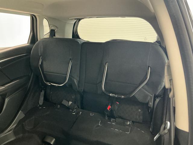 フィット13G・Fパッケージ 禁煙車 ワンオーナー ナビTV ETC1年保証 禁煙車 ワンオーナー ナビTV ETC バックカメラ 後席モニター Bluetooth スマートキー プッシュスタート 横滑り防止装置 オートライト オートエアコン ドアバイザー(兵庫県)の中古車