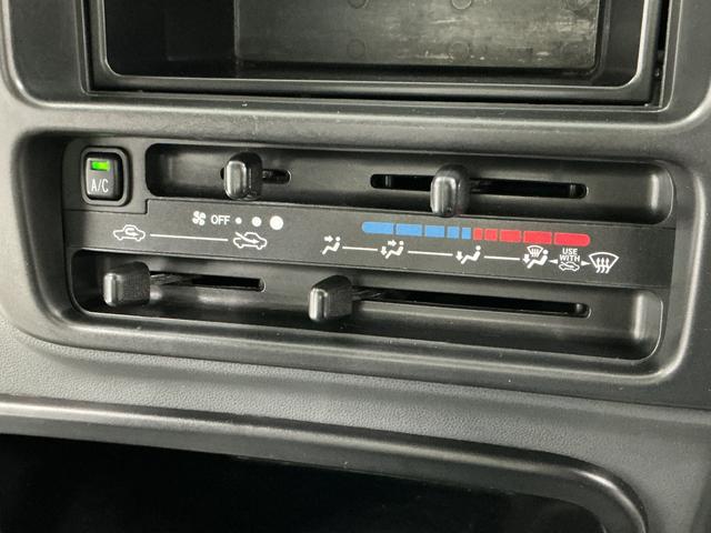 ハイゼットトラックエアコン・パワステ スペシャル 5MT ワンオーナーMT車 1年保証 ワンオーナー ポータブルナビ ラジオ 3方開 ゲートプロテクター 荷台マット リアゲートチェーン ドアバイザー ヘッドライトレベライザー シガーソケット マニュアルエアコン(兵庫県)の中古車