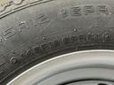 走行無制限１年保証　ＭＴ車　オートライト　３方開　ドアバイザー　ヘッドライトレベライザー　ラジオ　アクセサリーソケット　マニュアルエアコン　スペアタイヤ　バッテリーカバー　ラバーフロアマット（兵庫県）の中古車