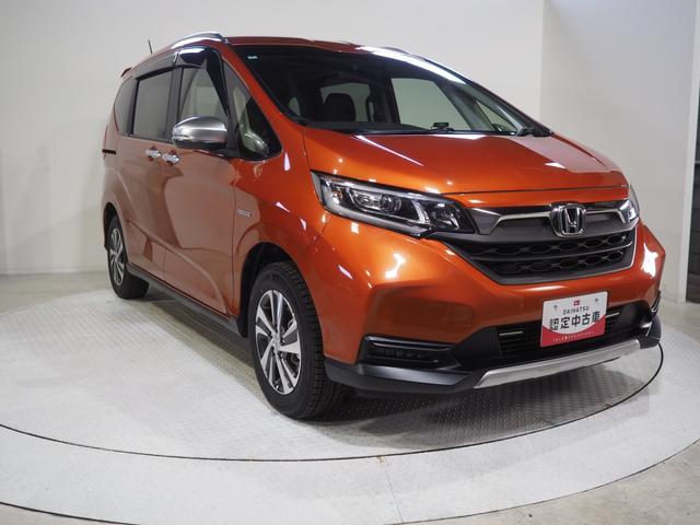 フリード＋ハイブリッドハイブリッド・クロスターホンダセンシング４ＷＤ　両側パワースライドドア　夏冬タイヤ　ホンダ純正ナビ　バックモニター　ドライブレコーダー　ＥＴＣ車載器　クルーズコントロール　シートヒーター　アルミホイール　ＬＥＤヘッドライト（北海道）の中古車