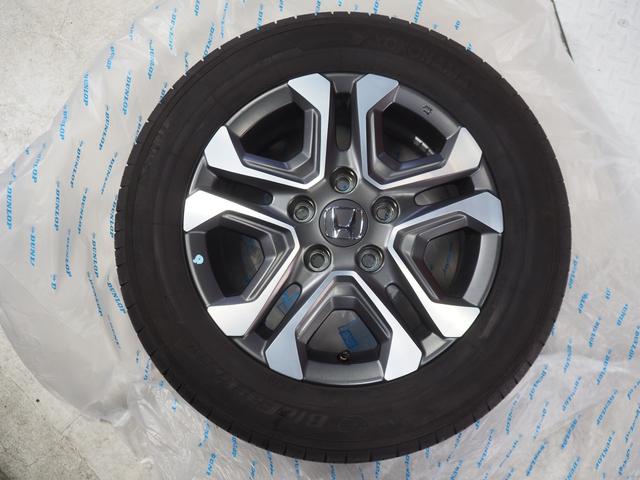 フリード＋ハイブリッドハイブリッド・クロスターホンダセンシング４ＷＤ　両側パワースライドドア　夏冬タイヤ　ホンダ純正ナビ　バックモニター　ドライブレコーダー　ＥＴＣ車載器　クルーズコントロール　シートヒーター　アルミホイール　ＬＥＤヘッドライト（北海道）の中古車