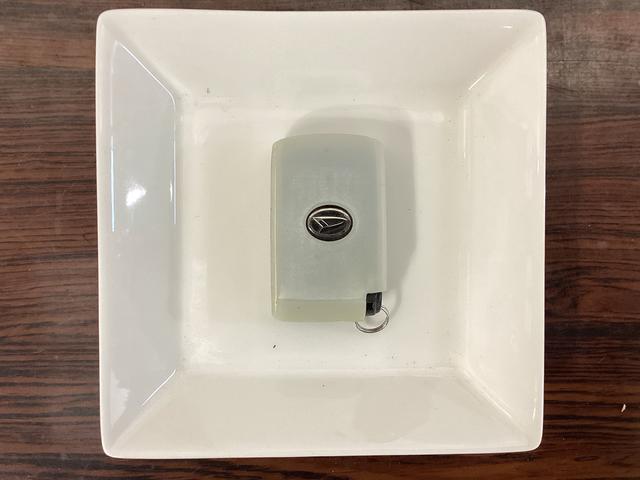 ムーヴX ETC ナビTV 電動格納ミラー アイドリングストップETC ナビTV DVD アクセサリーソケット 電動格納ミラー ヘッドライトレべライザー アイドリングストップ プッシュボタンエンジンスタート ドアバイザー 14インチ純正アルミホイール(京都府)の中古車